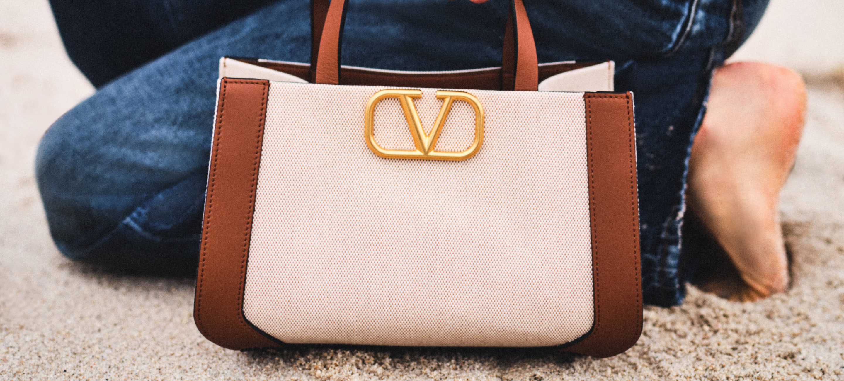 Italian fashion house known for leather handbags sale